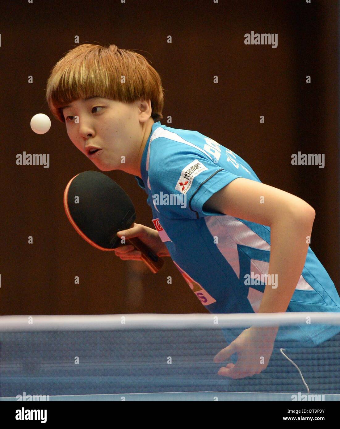 Kuwait City, Kuwait. 12th Feb, 2014. Zhou Yihan of Singapore serves the