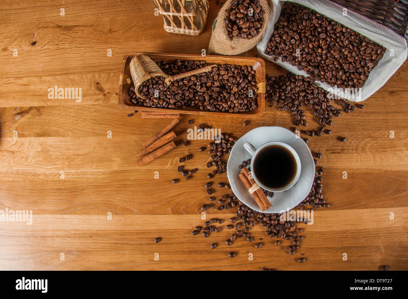 Coffee theme with wooden table and dark background Stock Photo - Alamy