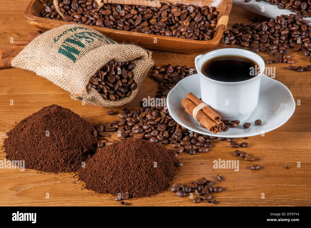 Coffee theme with wooden table and dark background Stock Photo - Alamy
