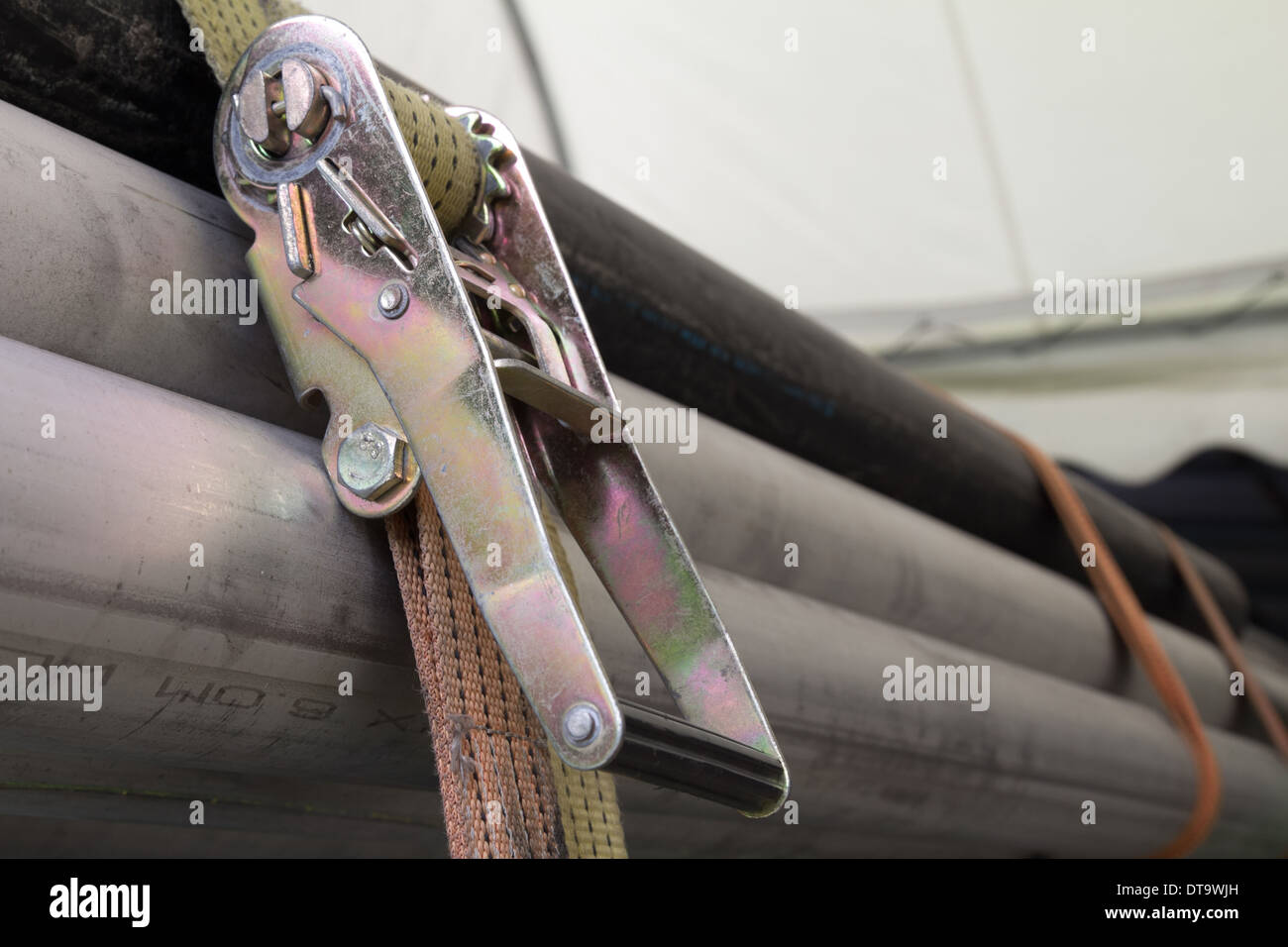 background of Ratchet Strap and pipe Stock Photo Alamy