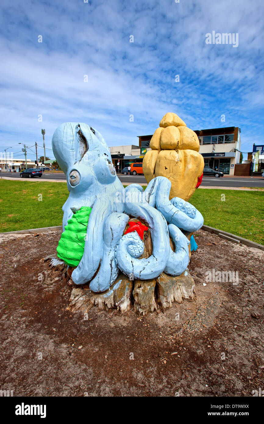 blue octopus carving park carved old tree trunk Mornington Peninsula Victoria Australia Stock Photo