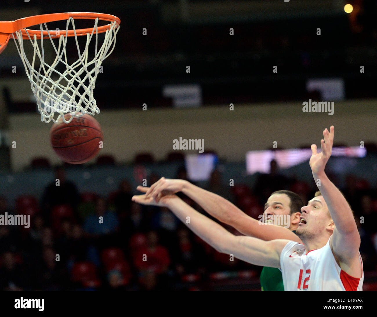 Uri Kokia of Haifa, left, and Rasid Mahalbasic of Nymburk fight for the