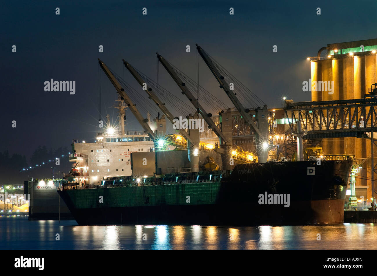 Ship loading grain at shipping terminal on the Burrard Inlet, Vancouver, BC. Canada. Stock Photo