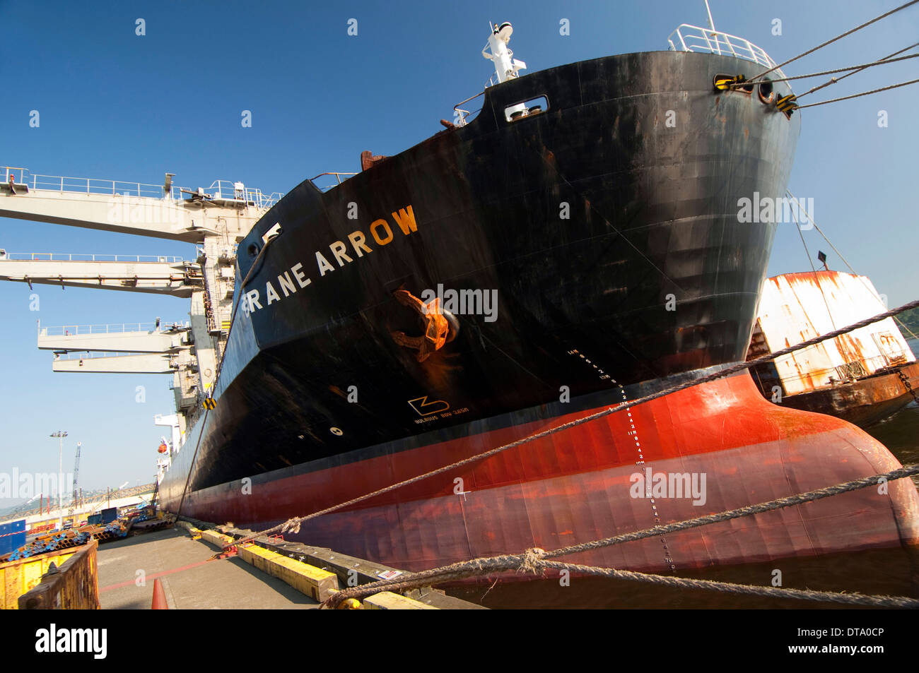 Ship loading at Lynnterm shipping terminal on the Burrard Inlet, Vancouver, BC. Canada. Stock Photo