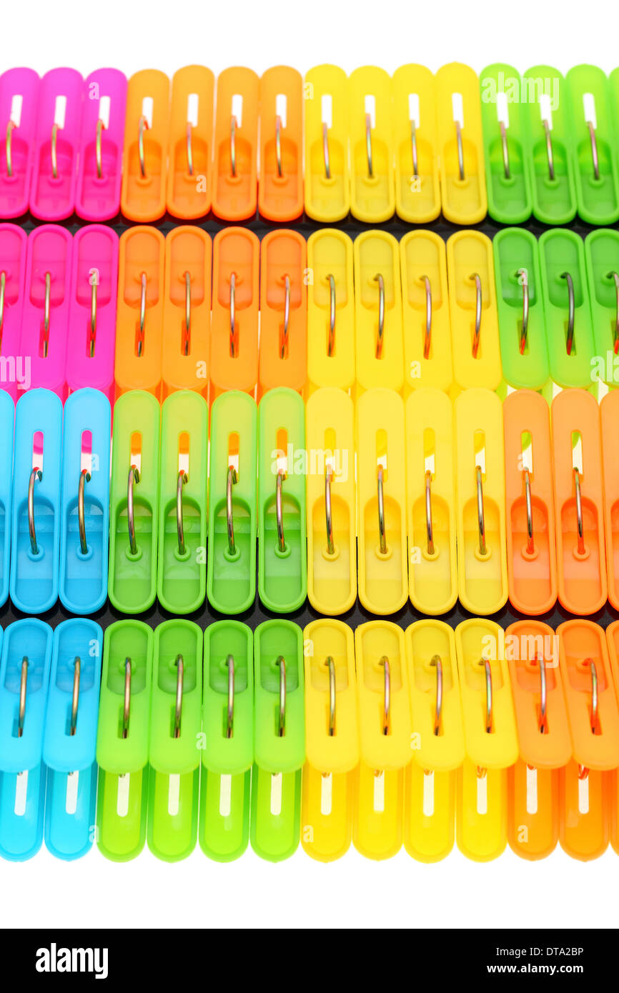 colorful plastic clothespins on white background Stock Photo