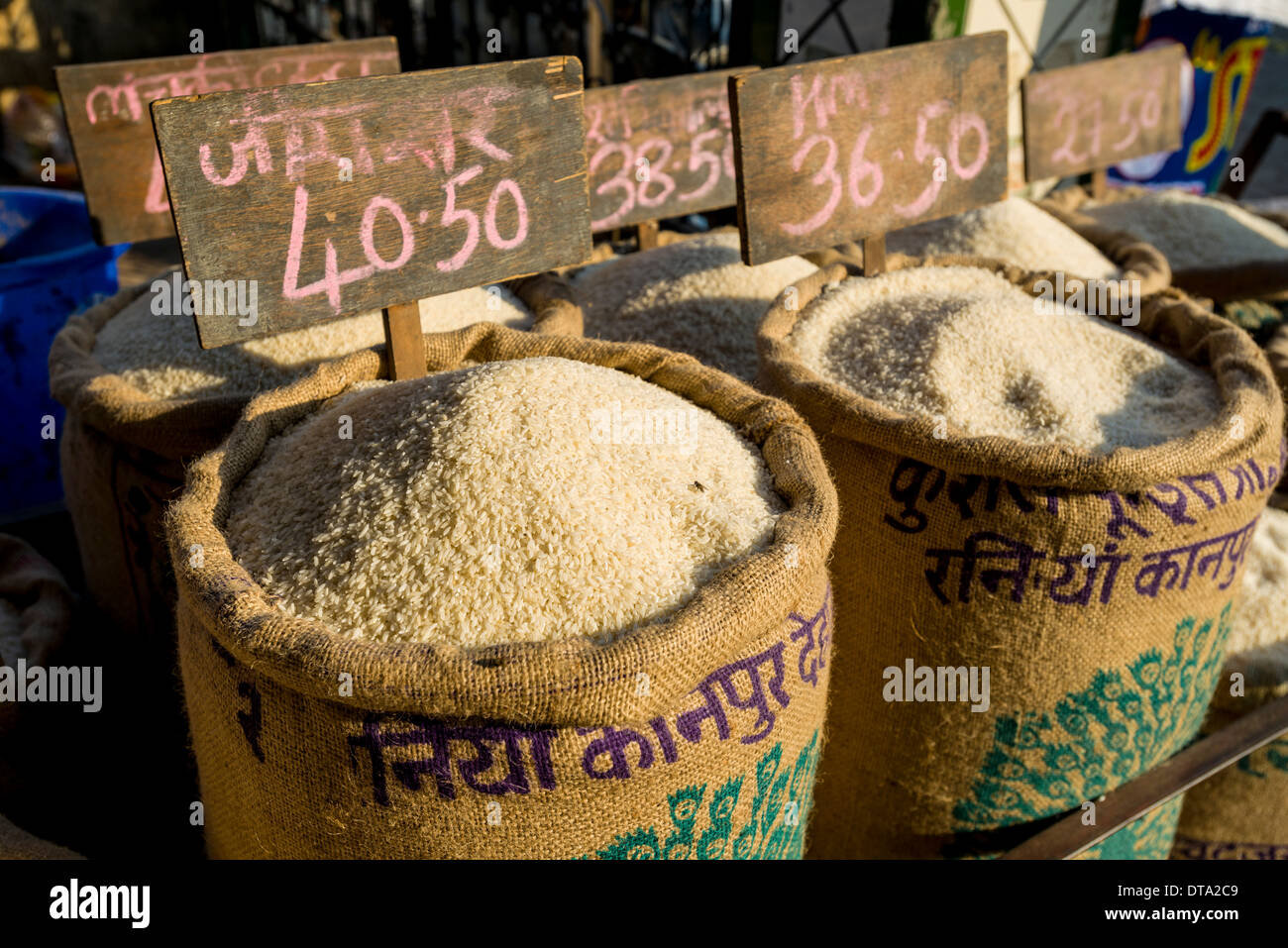 Rice in different qualities for sale in bags at an open air market, Mumbai, Maharashtra, India Stock Photo