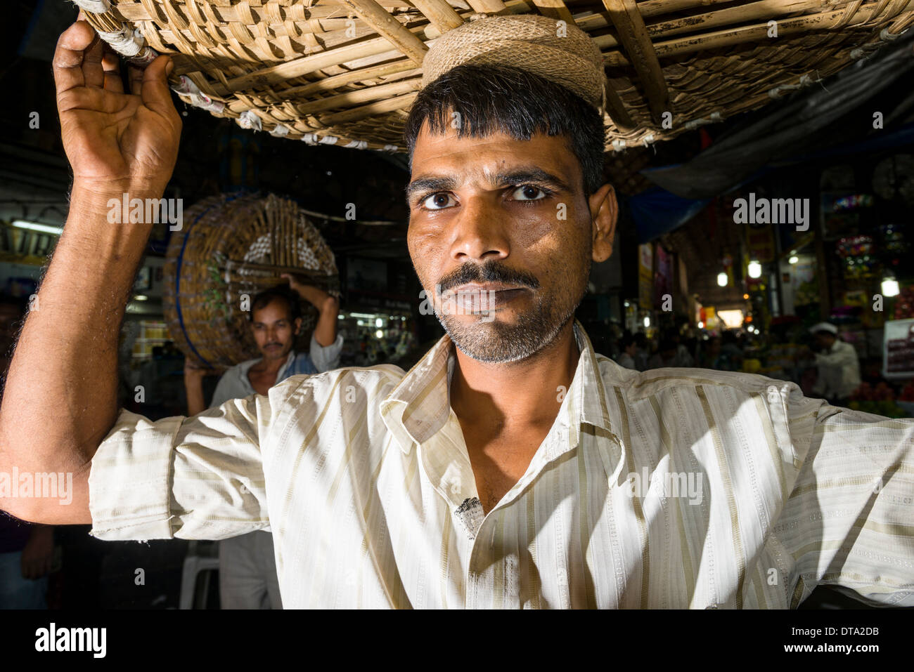 Portrait of a porter at Crawfort Market, Mumbai, Maharashtra, India Stock Photo