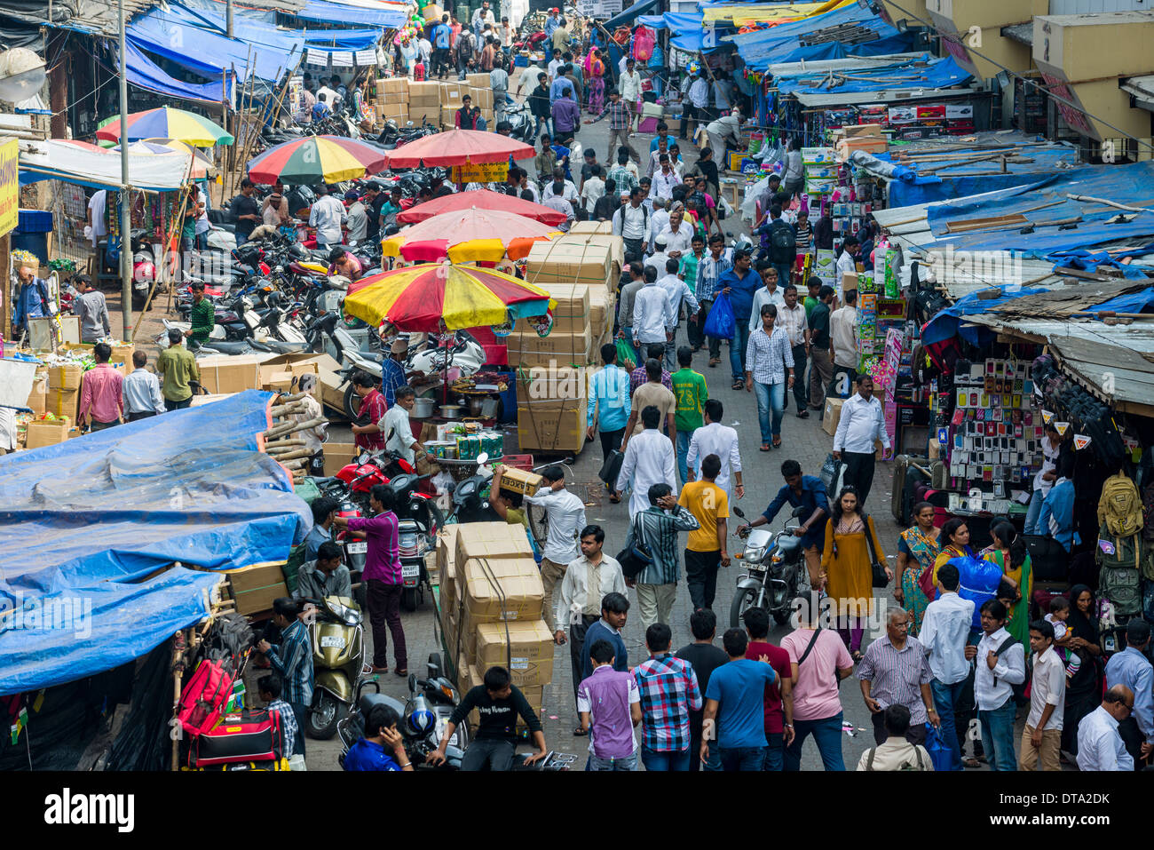 Crowded street with shops at Mangaldas Market, Mumbai, Maharashtra, India Stock Photo