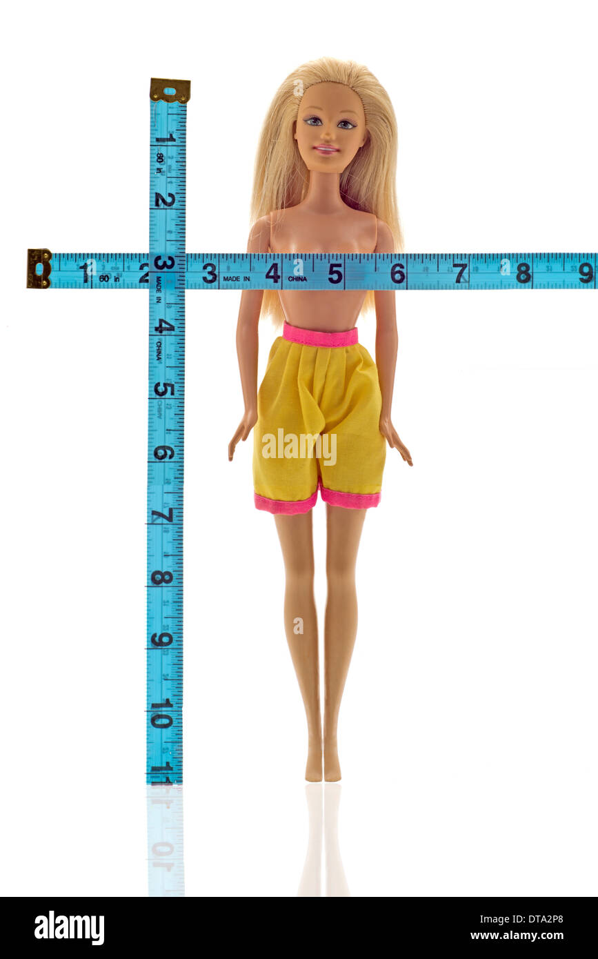 Doll being measured, ideal measurements Stock Photo