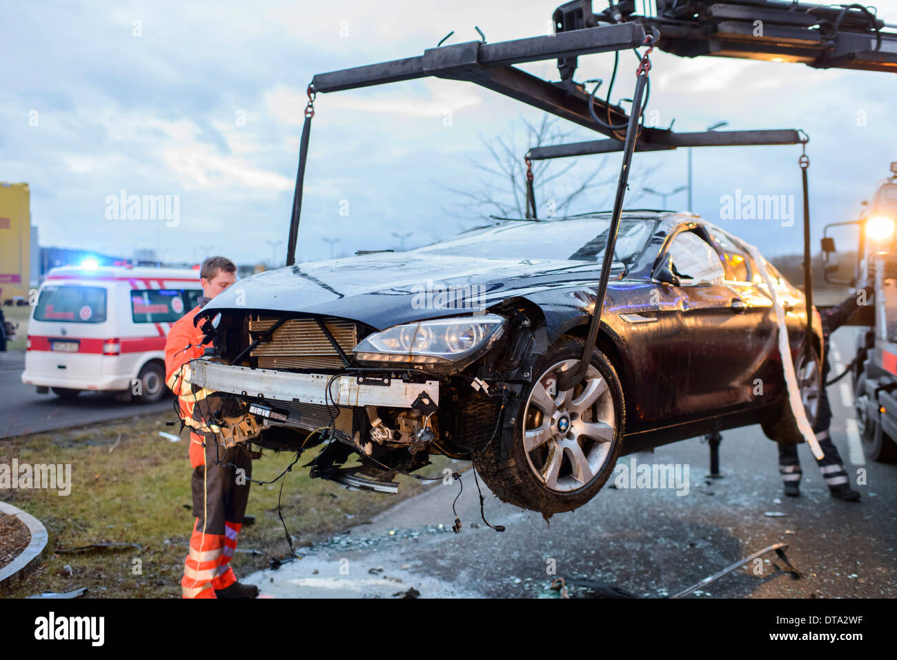 Scene of an accident, BMW sports car being recovered by a breakdown