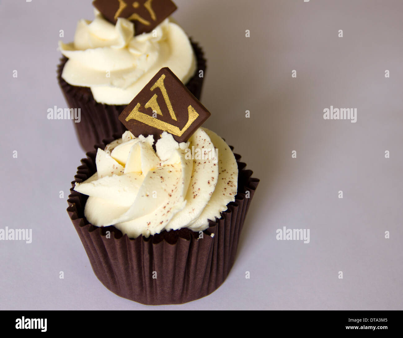 'Designer' Cupcakes with Louis Vuitton Logo on Choc Chip Stock Photo