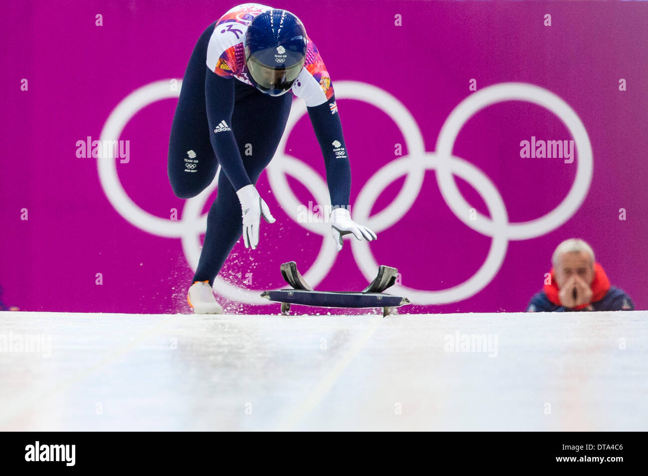 Sochi, Russia. 13th Feb, 2014. Lizzy YARNOLD (GBR) at the start of her first run in the Women's Skeleton competition at the Sanki Sliding Centre, Mountain Cluster - XXII Olympic Winter Games Credit:  Action Plus Sports Images/Alamy Live News Stock Photo