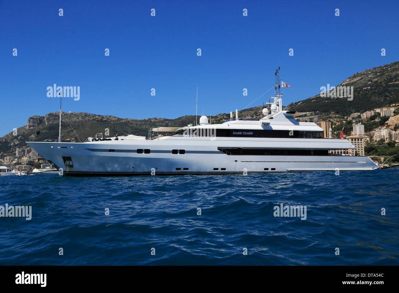 Proteksan Turquoise motor yacht Double Trouble at anchor in front of the Principality of Monaco Stock Photo