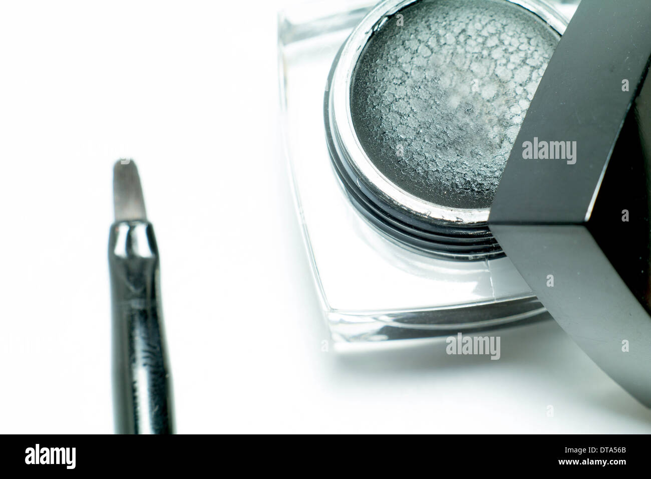 Multi colored make-up eye liner and brush Stock Photo