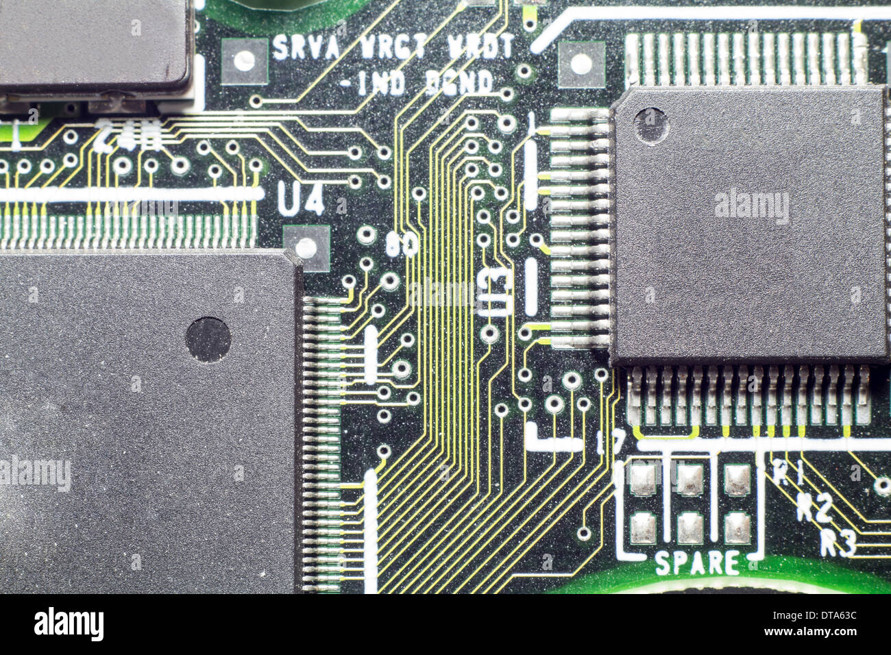 Microchips by other elements on a circuit board Stock Photo - Alamy