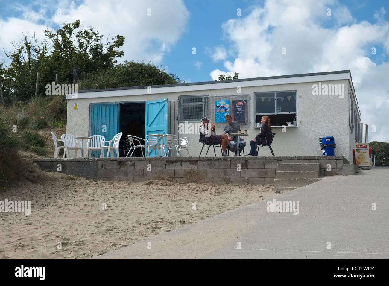 Chilling out at the cafe on Abersoch Beach Stock Photo