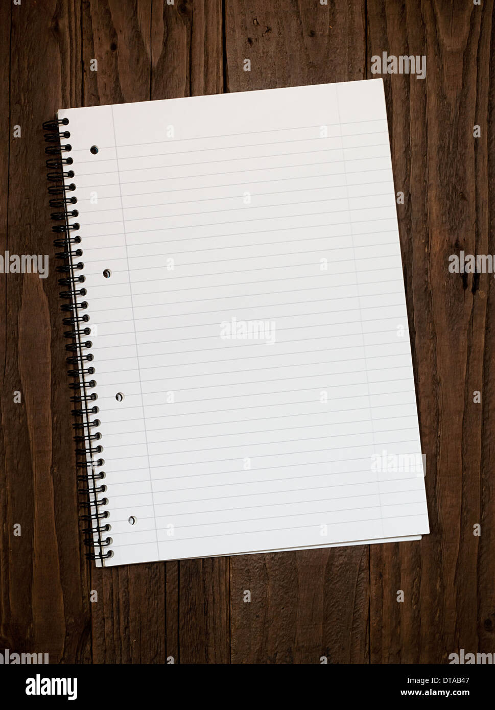 Empty lined ringbinder page with copy space for your message on a dark Stock Photo