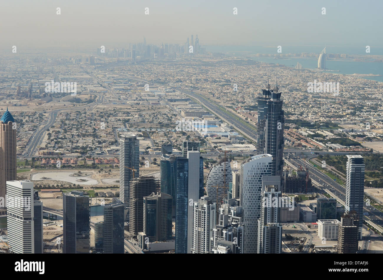 Looking south-west across Dubai from the top of the Burj Khalifa, the world's tallest building. Stock Photo