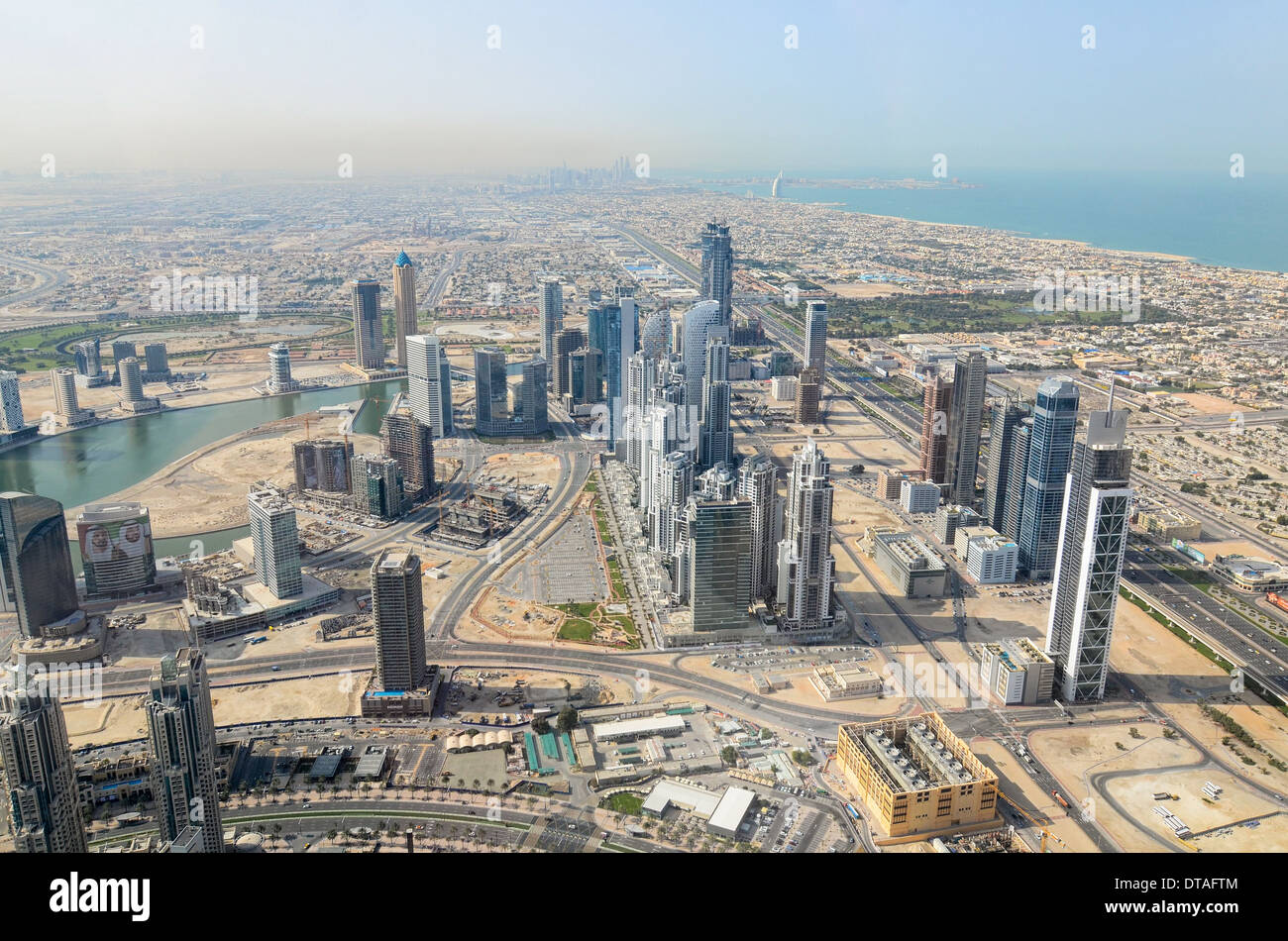 Looking south-west across Dubai from the top of the Burj Khalifa, the world's tallest building. Stock Photo