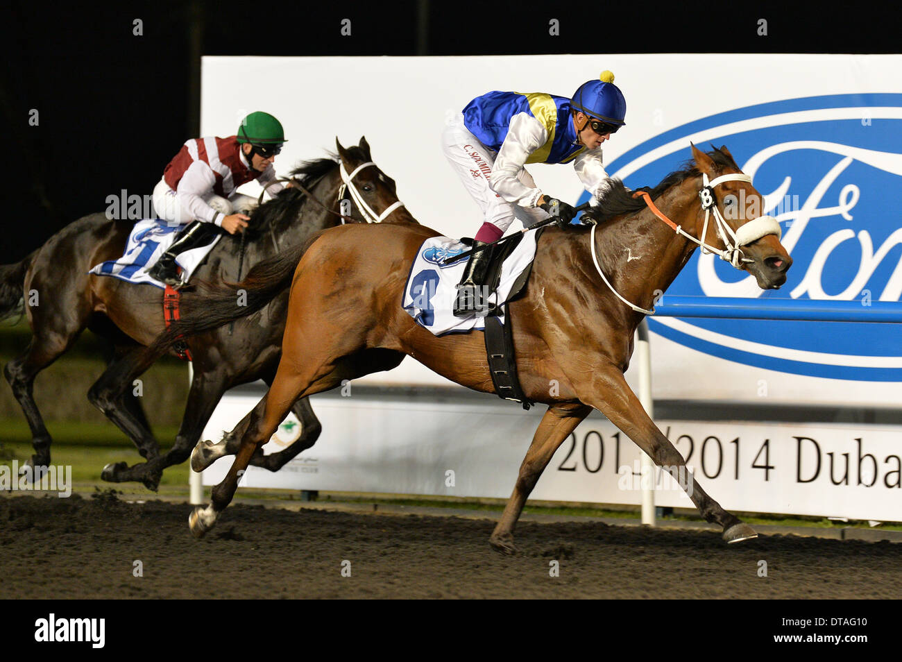 DUBAI, UAE, 13th Feb 2014. Sanshaawes ridden by Christophe Soumillon wins the Ford F-150 Raptor Trophy at the Meydan race track. The horse is trained by M de Kock Credit:  Feroz Khan/Alamy Live News Stock Photo