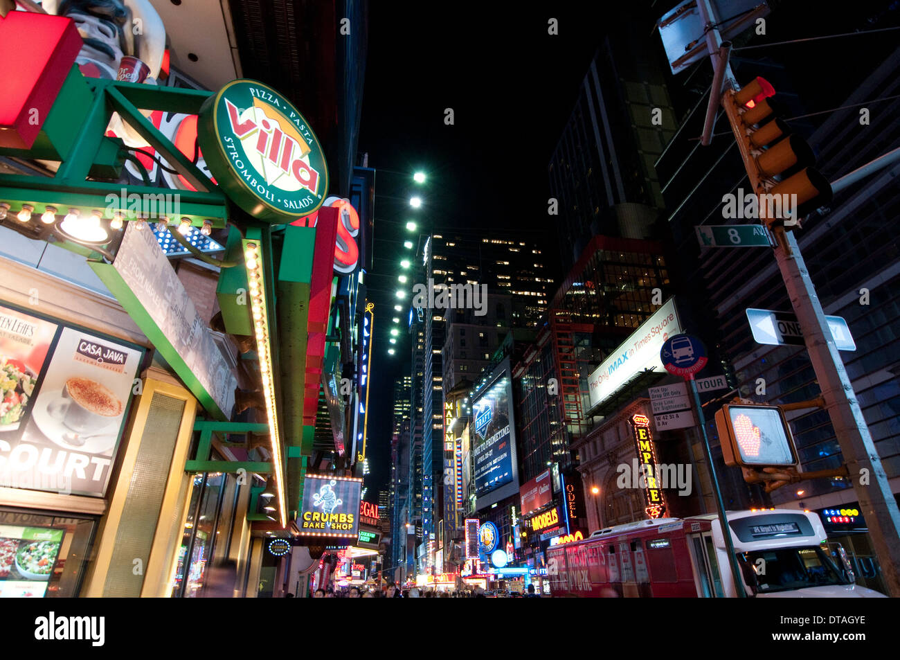 42nd St by night, Midtown Manhattan New York City USA Stock Photo