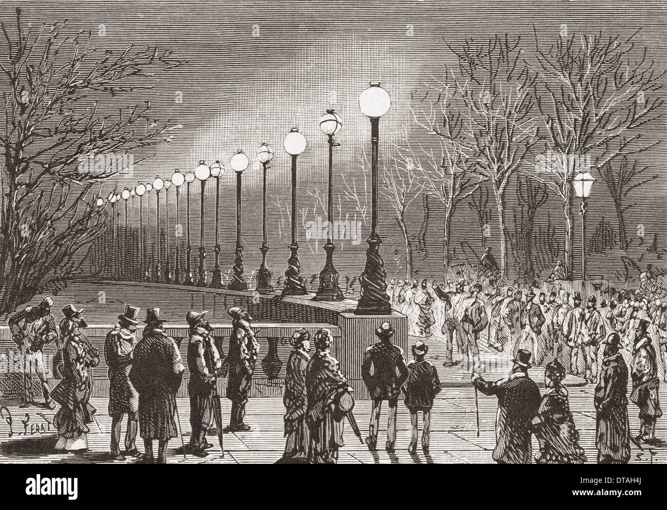 Crowds admiring the electric lights on Victoria Docks, London Stock
