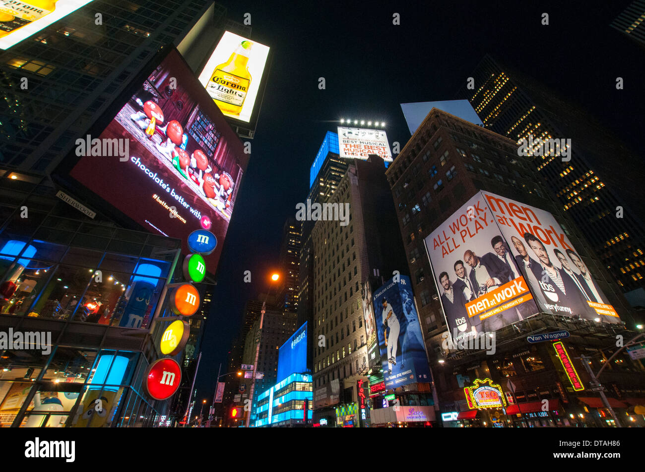 7th Avenue by night, Times Square New York City USA Stock Photo