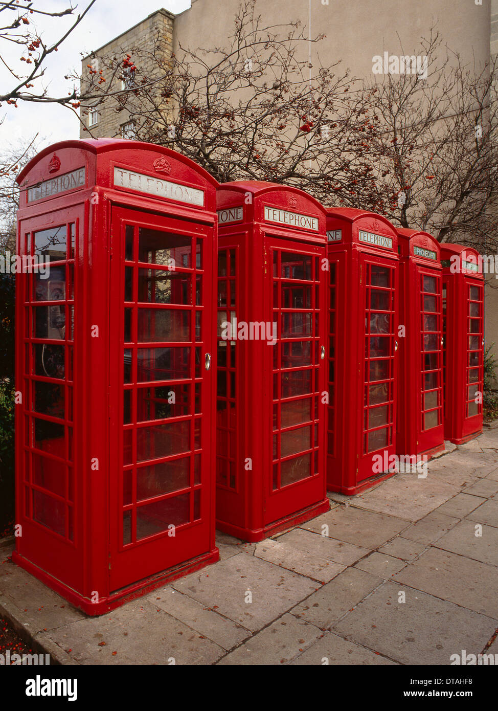 row of five K3 red telephone boxes and phonecard boxes, designed by ...