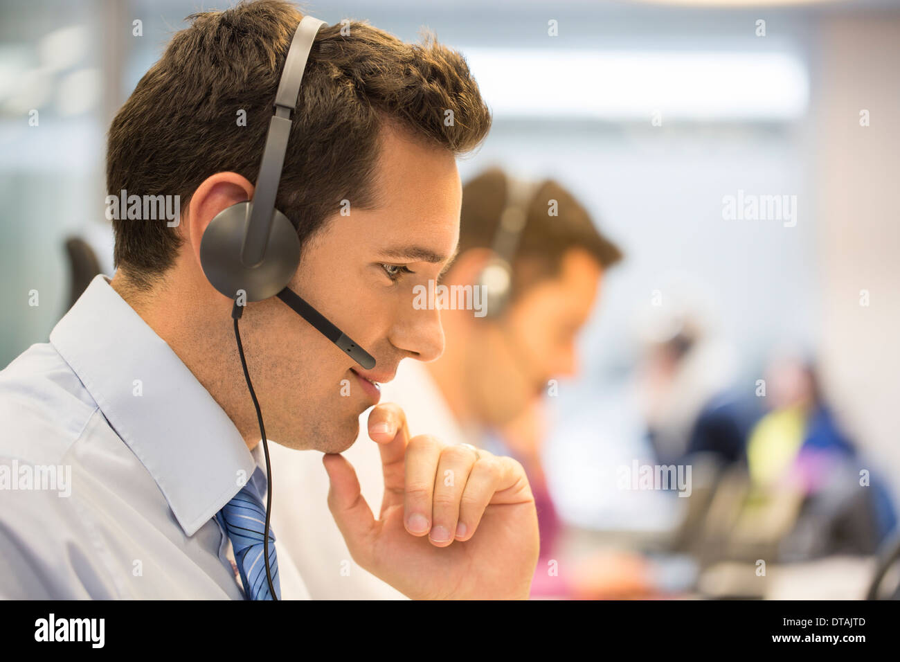 Businessman talking in the micro operator in the office Stock Photo