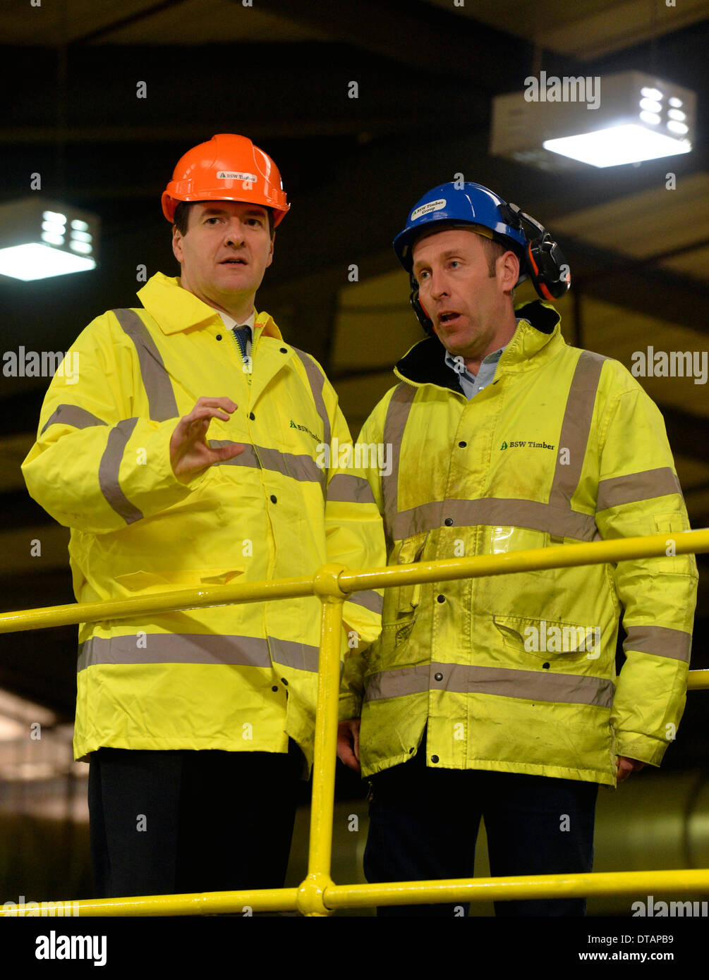 Cargo, Cumbria . 13th Feb, 2014. Chancellor of the Exchequer George Osborne MP visits the BSW Timber Sawmill at Cargo, Carlisle. Mr Osborne toured the Carlisle mill as BSW Timber revealed they were creating 60 new jobs at their Carlisle and Dalbeattie Sawmills. George Osborne MP (left) chats with BSW employee Mark Smith: 13 February 2014 STUART WALKER  Stuart Walker Photography 2014 Credit:  STUART WALKER/Alamy Live News Stock Photo