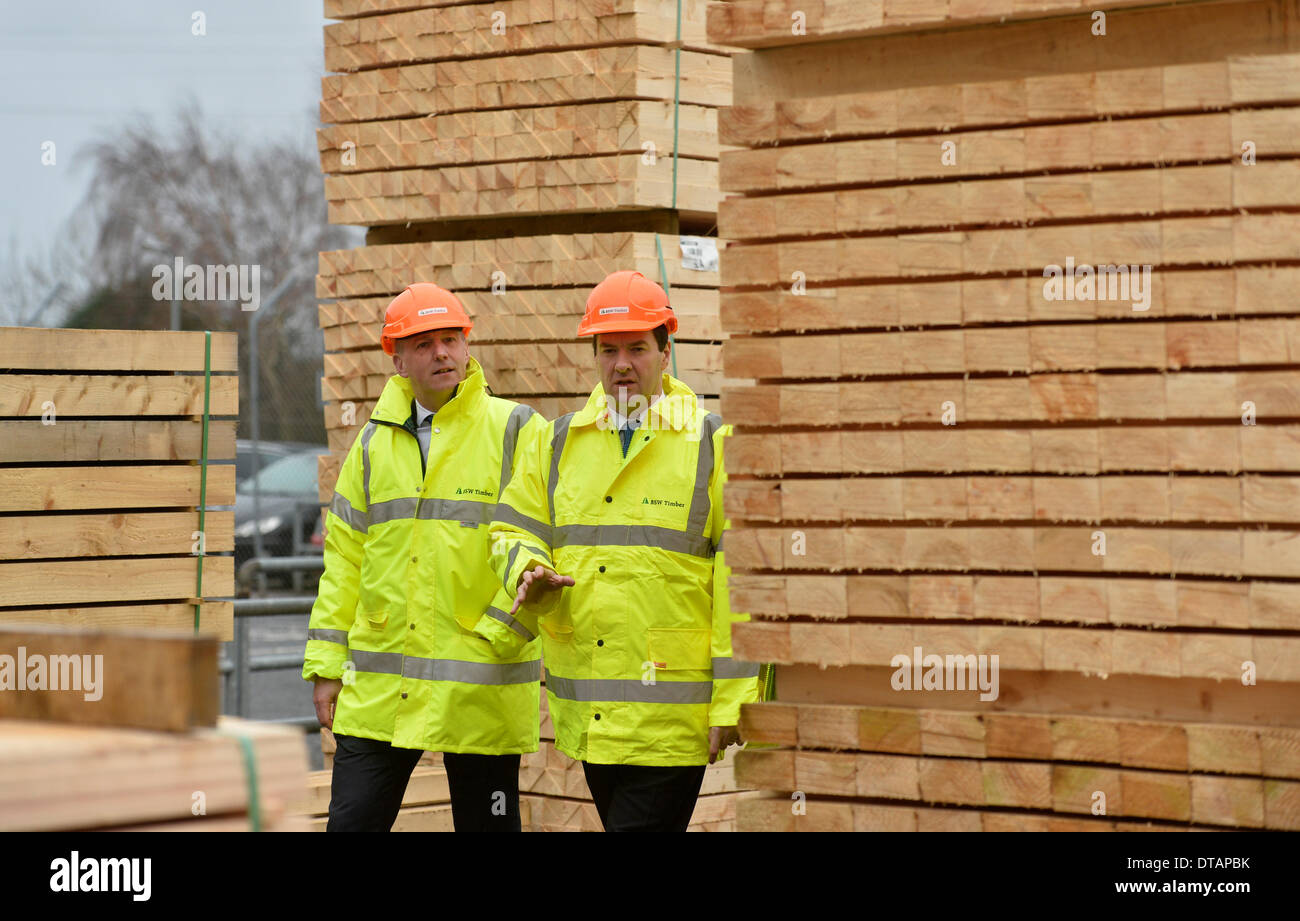 Cargo, Cumbria . 13th Feb, 2014. Chancellor of the Exchequer George Osborne MP visits the BSW Timber Sawmill at Cargo, Carlisle. Mr Osborne toured the Carlisle mill as BSW Timber revealed they were creating 60 new jobs at their Carlisle and Dalbeattie Sawmills. Carlisle MP John Stevenson (left) with George Osborne MP: 13 February 2014 STUART WALKER  Stuart Walker Photography 2014 Credit:  STUART WALKER/Alamy Live News Stock Photo