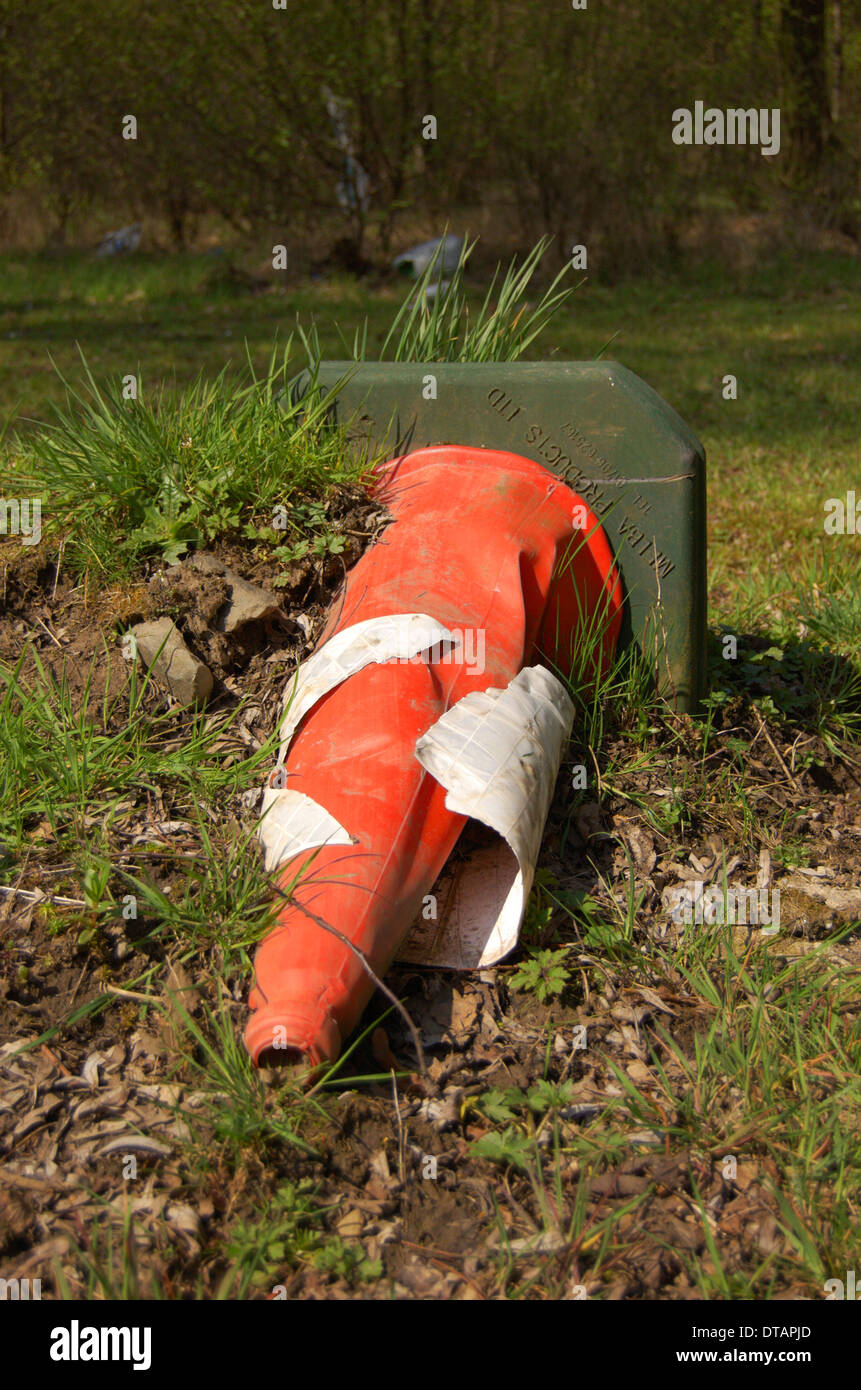 Discared traffic cone in Sighthill Park in Glasgow, Scotland Stock