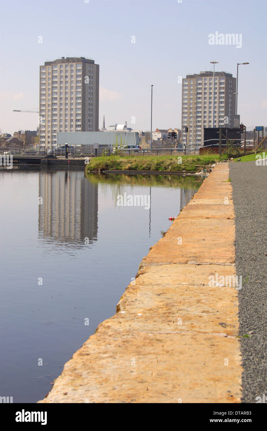 Canal at Port Dundas and high rise flats in Glasgow, Scotland Stock