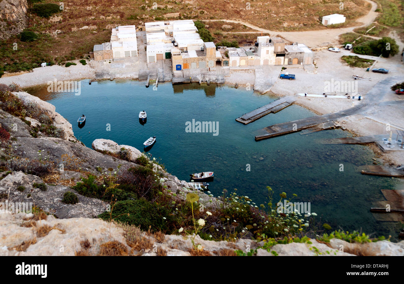 The Shallow inland lagoon of Dwejra. One of the most spectacular natural landmarks on the small island of Gozo. Stock Photo