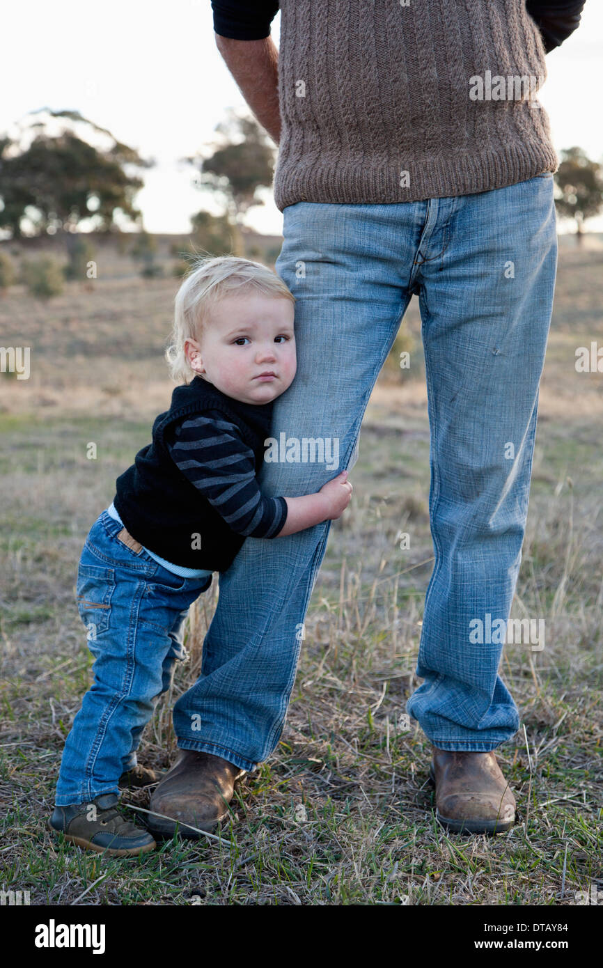 Grandfather with grandson, looking at camera Stock Photo