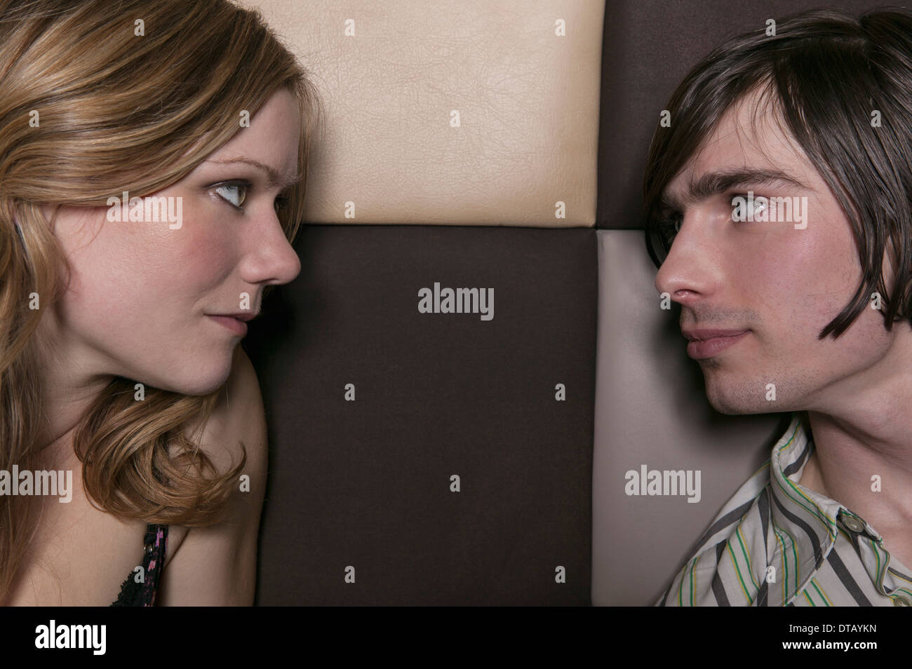 A couple looking at each other intensely, close-up Stock Photo