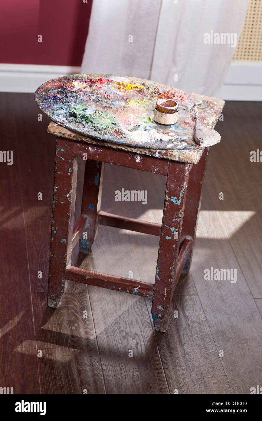 Palette on stool, close-up Stock Photo