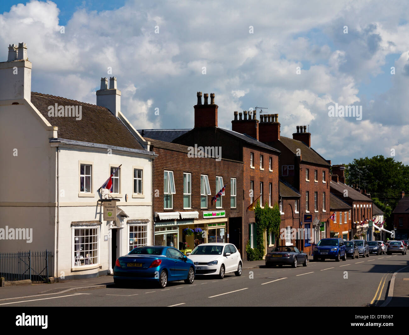 Traditional high street shops and houses in Tutbury village Staffordshire North Midlands England UK Stock Photo