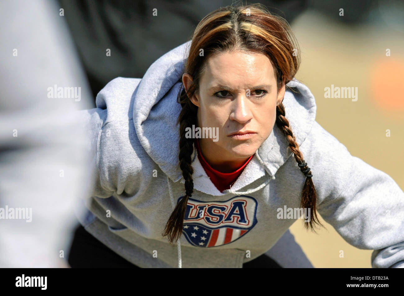 Feb. 13, 2014 - Allen, TX, United States of America - Jennifer Welter participates in a drill during practice Thursday, February 13, 2014, in Allen, Texas. The 5-foot-2-inch, 130 pound Welter is the first woman to try out for a professional football team at a position other than kicker, she is trying to make the Texas Revolution of the Arena Football League, as a running back. Stock Photo