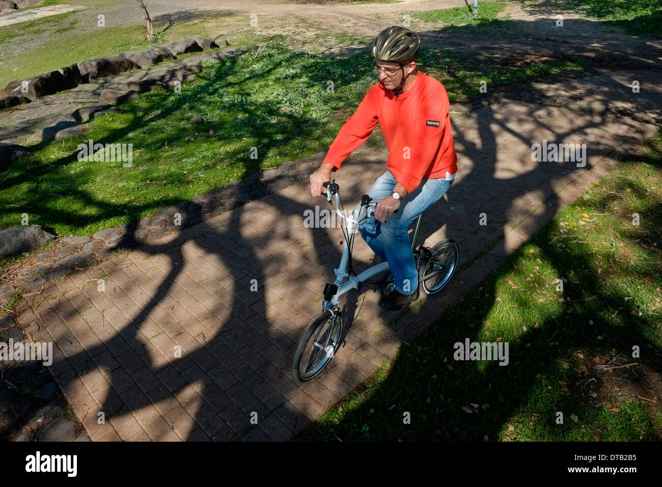 A cycler in a park in Galilee northern Israel Stock Photo