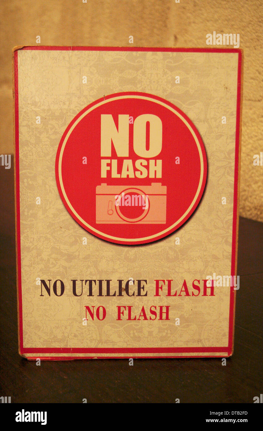 Sign warning visitors not to use flash when taking photographs inside Seville Cathedral (Catedral) Seville, Andalusia, Spain. Stock Photo