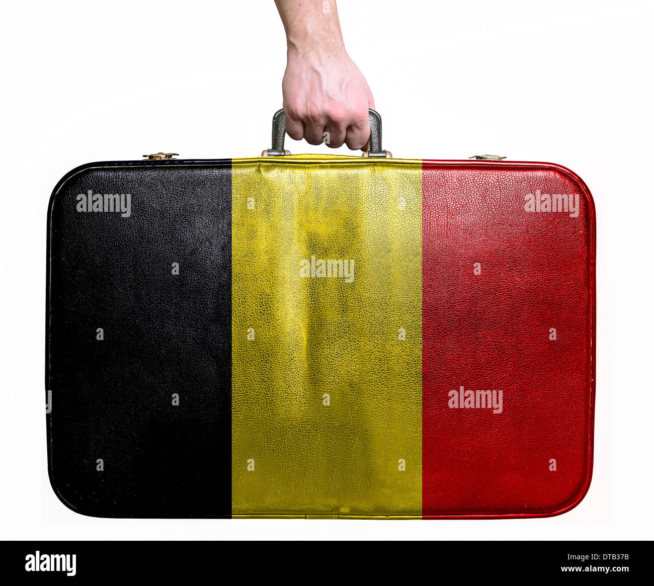 Tourist hand holding vintage leather travel bag with flag of Belgium Stock Photo Alamy