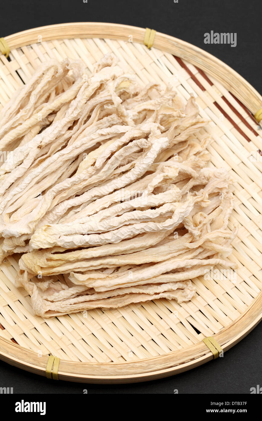 dried radish slice on bamboo basket, japanese food ingredient Stock Photo