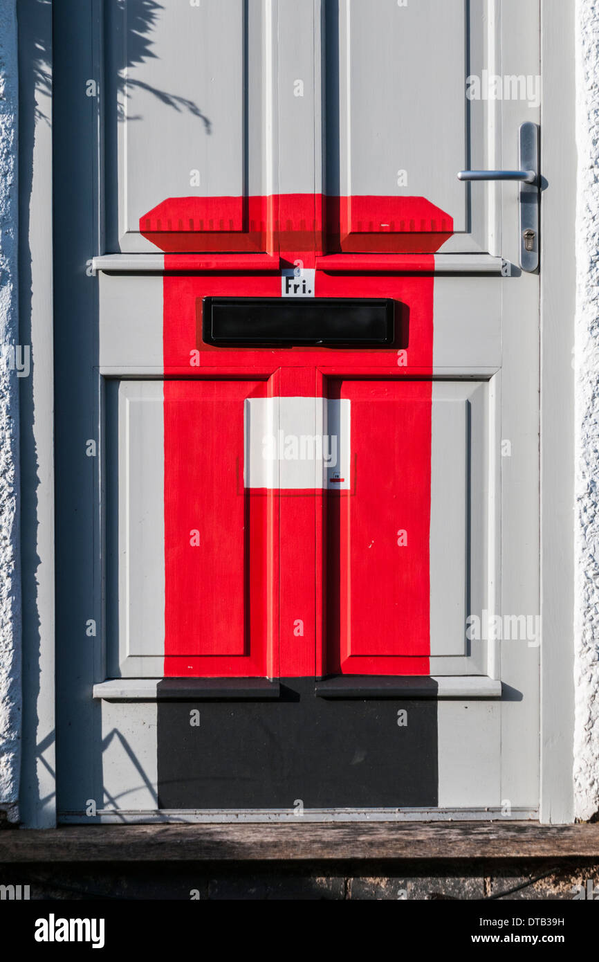British Red Post Box Painted Onto The Front Door Of A