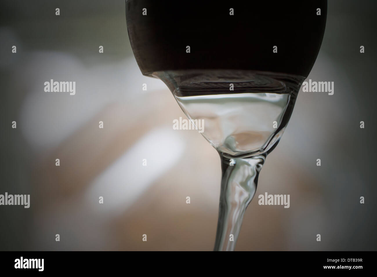 Water running from a faucet. Stock Photo