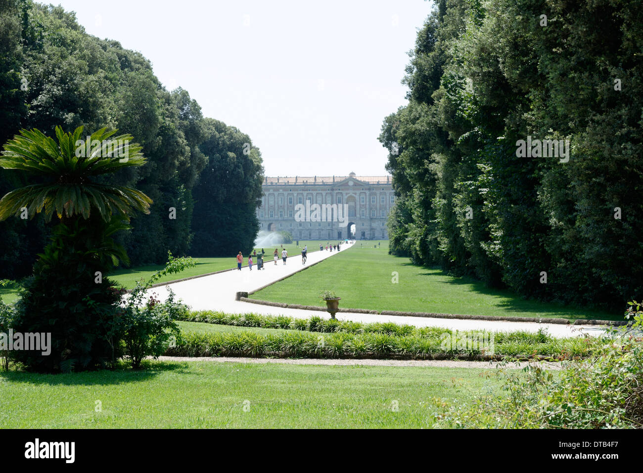 Part view from Margherita or Basket fountain with rear Royal Palace Caserta in background Caserta Italy This Stock Photo
