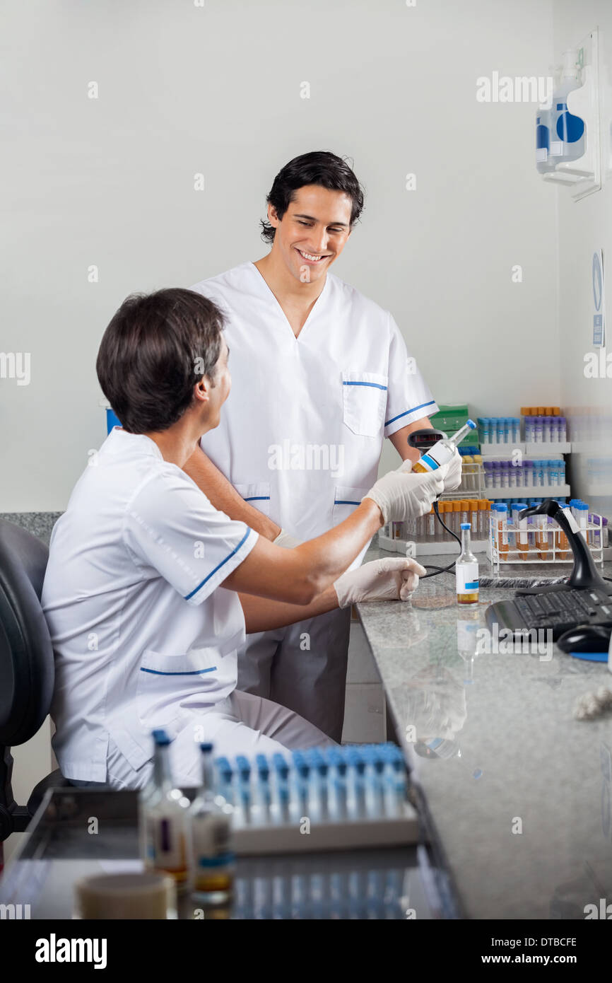 Technicians Scanning Barcode On Specimen Stock Photo - Alamy