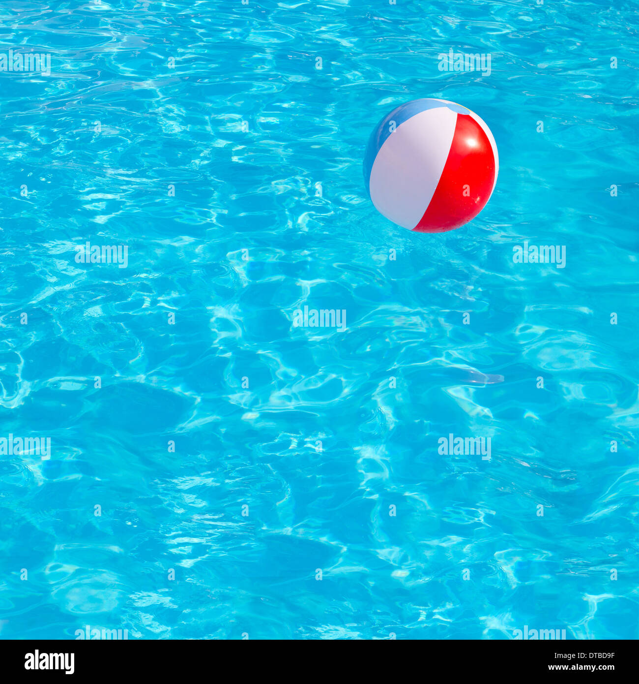 Inflatable colorful ball floating in swimming pool Stock Photo Alamy