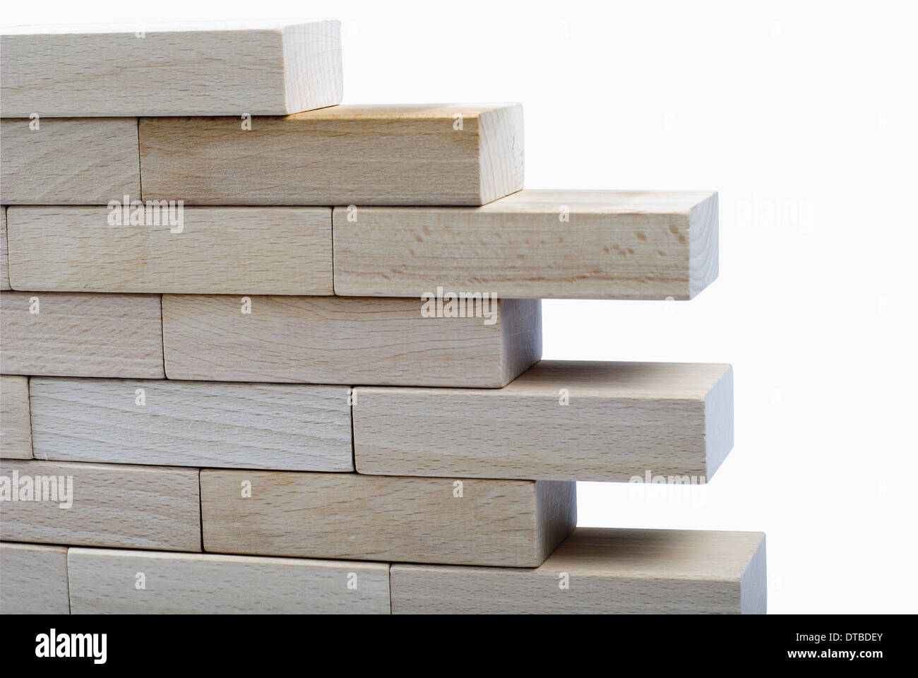 The wall from wooden bricks isolated on white background with clipping ...