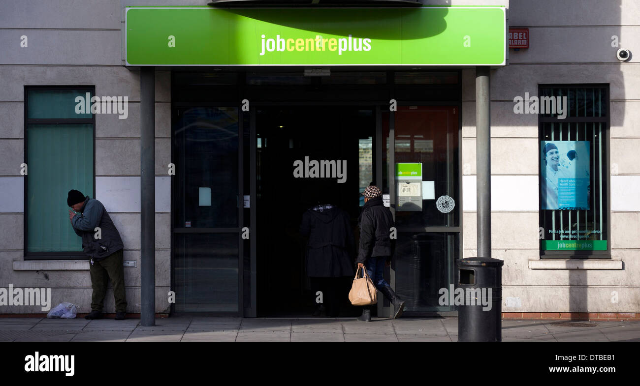 United Kingdom, London A man stands outside a job centre plus in